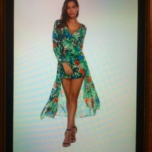 Maxi  romper full length open dress brand new. Size 10 Fabulous.